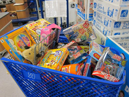 Shopping cart filled with toys & games